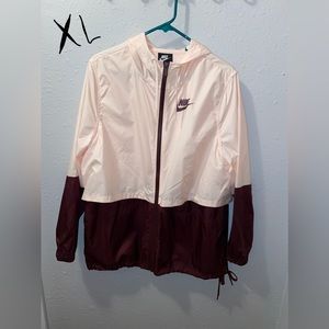 Nike zip up rain jacket. Never worn.